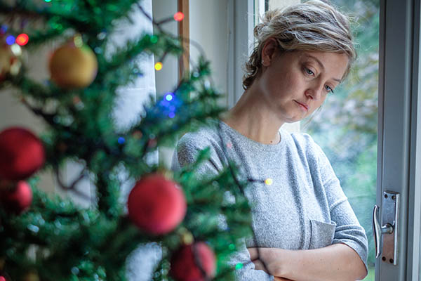 Woman feeling anxiety around the holidays