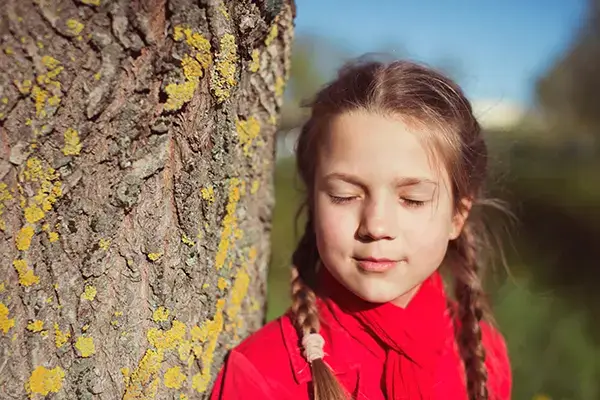 Young girl practicing mindfulness exercises learned in child therapy sessions in Thousand Oaks, CA, demonstrating valuable coping skills developed through therapy