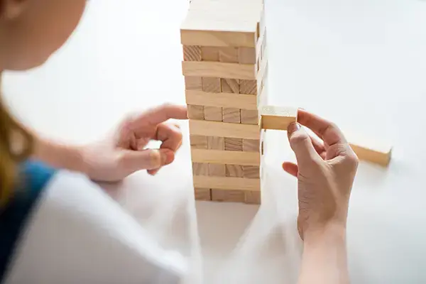 Child participating in a therapeutic game during a therapy session in Thousand Oaks, CA, showcasing effective techniques used in child therapy